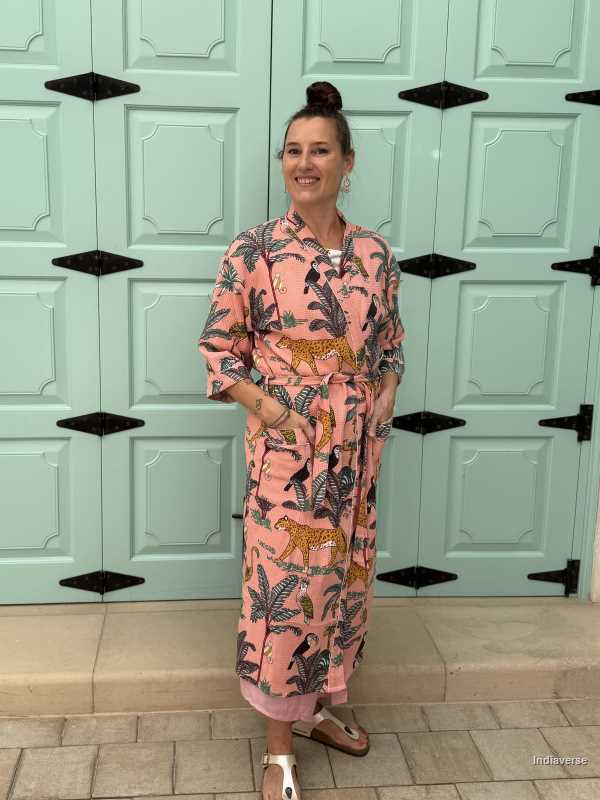 Model is wearing the Peach Jungle Waffle Cotton Bathrobe a lightweight, breathable robe made from pure cotton. Quick-dry, soft, and perfect for daily use or spa days.