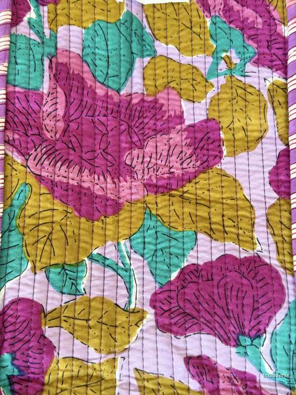 hand block printed quilted cotton tote bag with abstract purple flower and perfect to carry all your essentials close up of the design