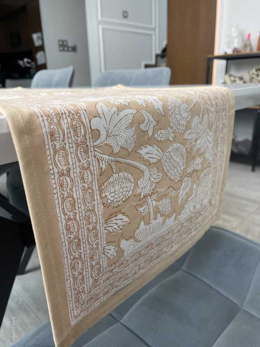 cream colored hand block printed table runner in cotton canvas