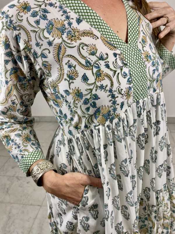 hand block printed soft cotton maxi dress in green and blue tones with complimenting floral designs and matching border and has a cotton underskirt