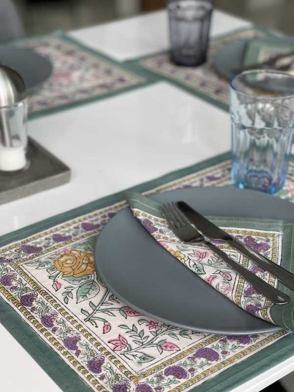 Exquisite 6-piece hand block printed placemat and napkin set in pure cotton stand out with a green purple floral design