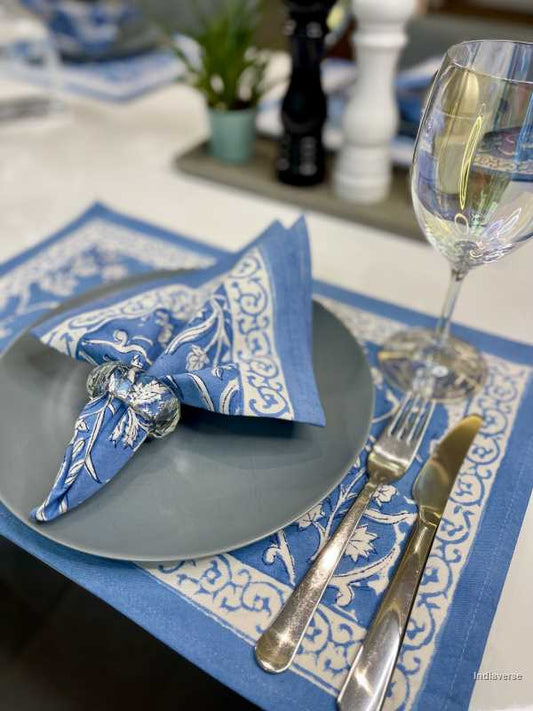 Blue white placemat napkin set for 6 people dining table with hand block printed pink floral design 