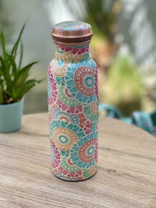 pastel-colored-copper-bottle-enameled-with-ethnic-design-for-drinking-water