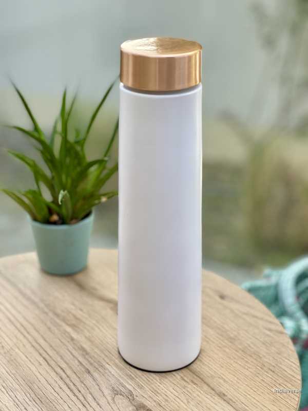 enameled white copper bottle with sleek elegant shape perfect for drinking water and capacity of 900 ml