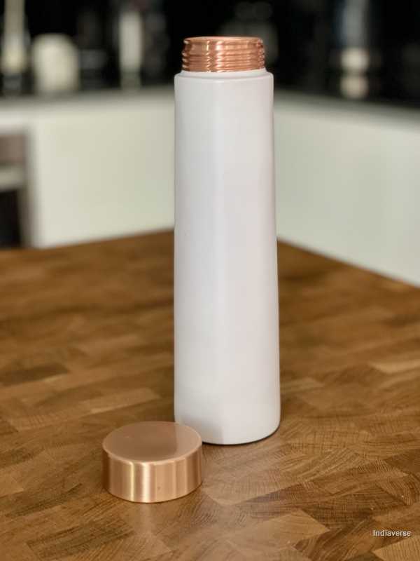 enameled white copper bottle with sleek elegant shape perfect for drinking water and capacity of 900 ml