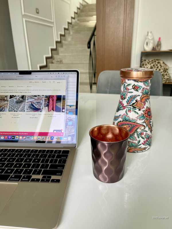 copper-jar-for-drinking-water-with-colorful-enameled-floral-design-and-lid