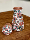 pure copper jar with lid and beautiful enameled floral details perfect for serving water and stylish addition to our home decor
