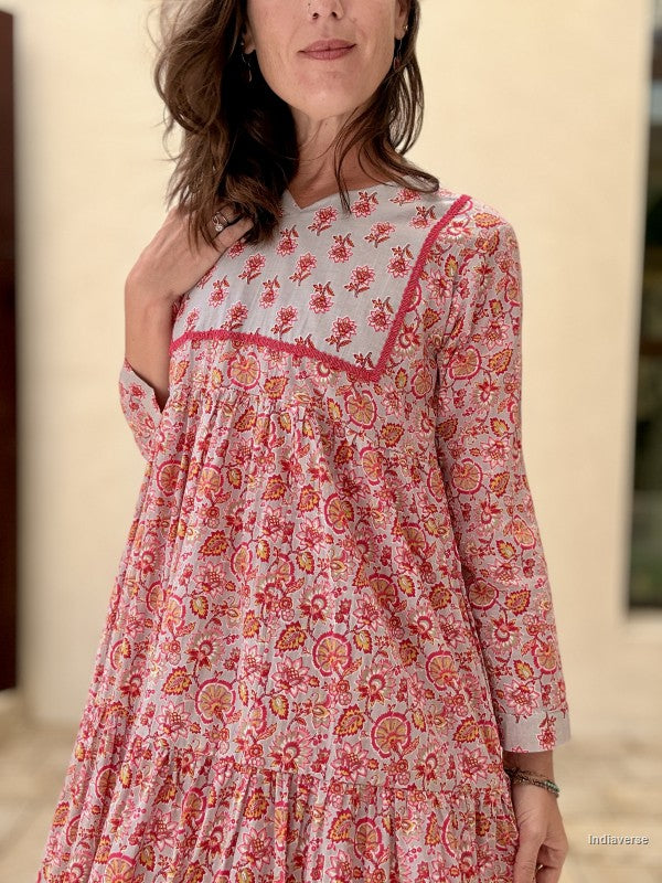 Woman wearing a floral dress with a blurred background