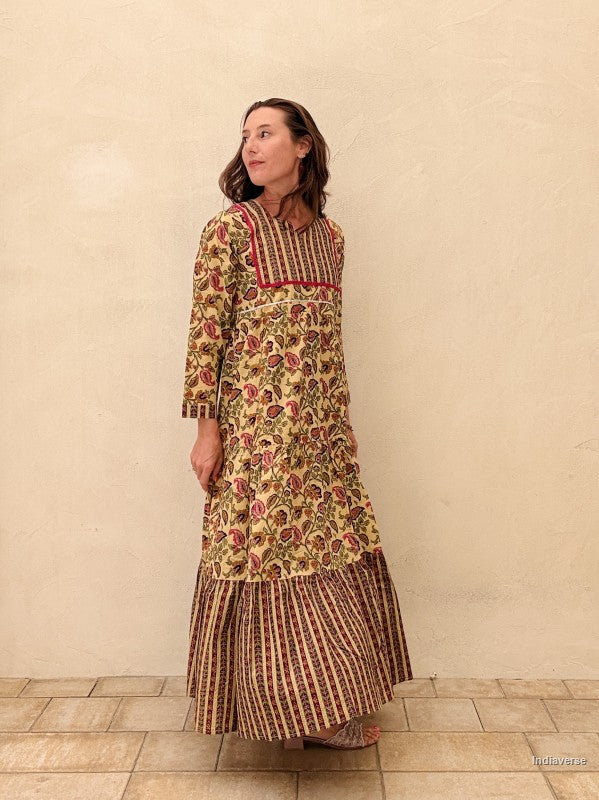 Woman wearing a floral dress with a plain background