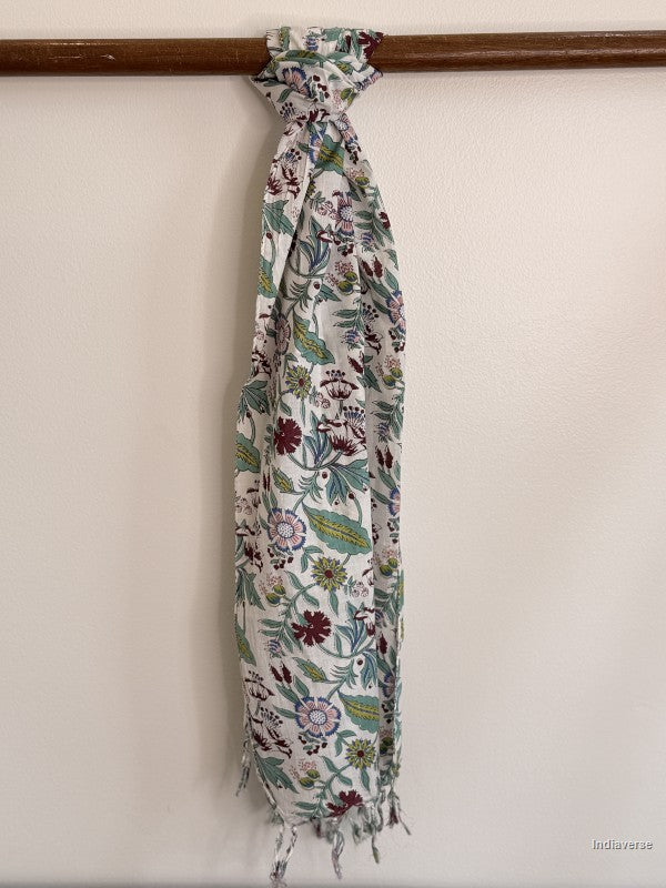 Cotton scarf with floral design tied to a wooden beam
