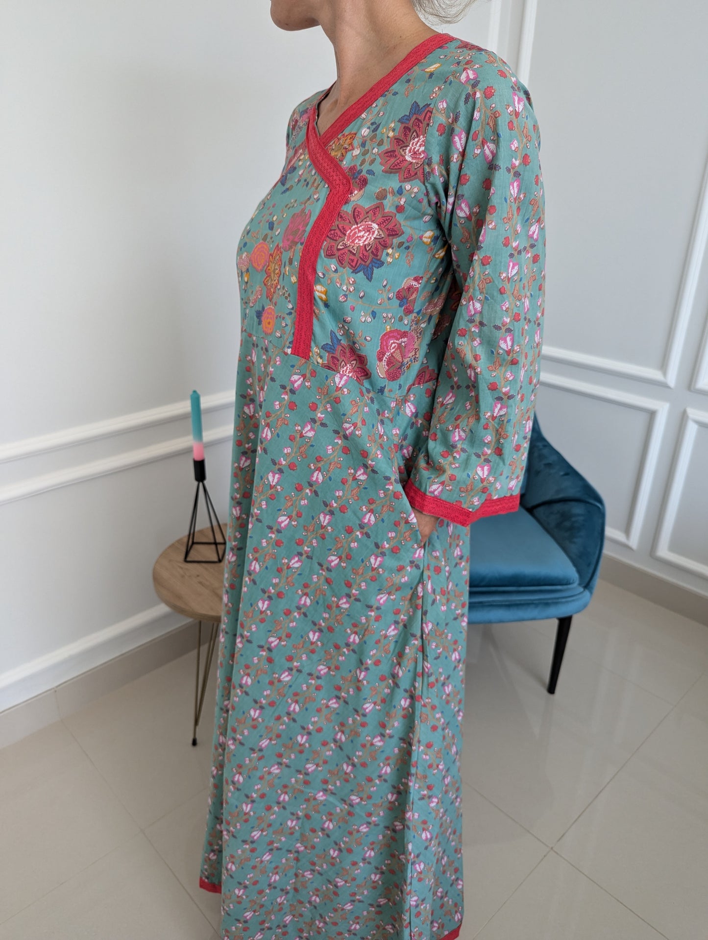 long-cotton-dress-base-color-aquamarine-in-wrap-dress-look-with-red-lace-border-and-red-flower-design