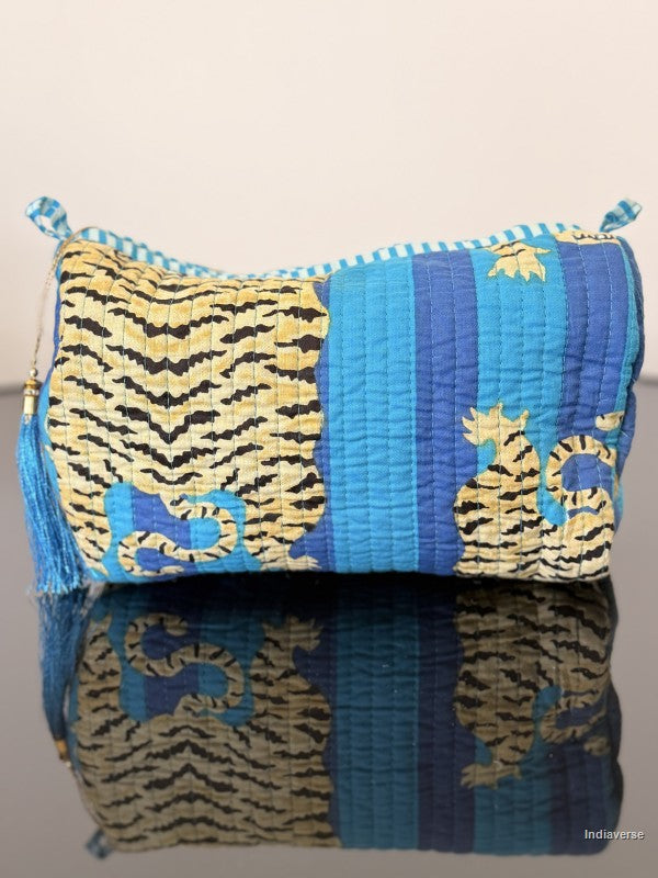 Decorative pillow with tiger pattern on a blue background