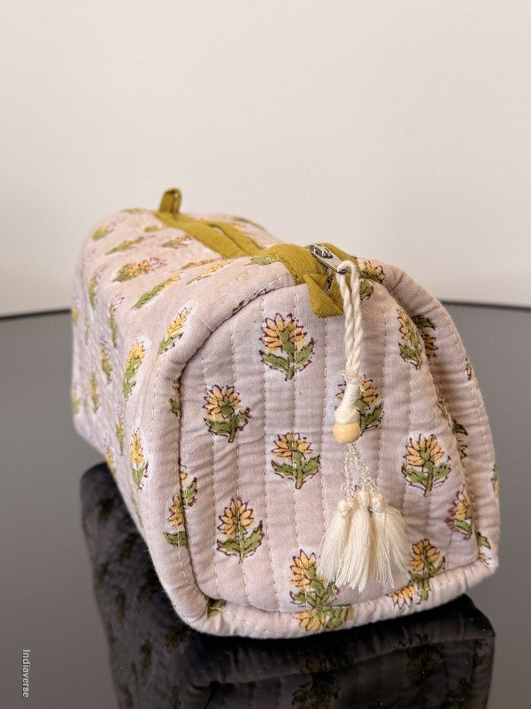 Floral-patterned drawstring bag on a white background