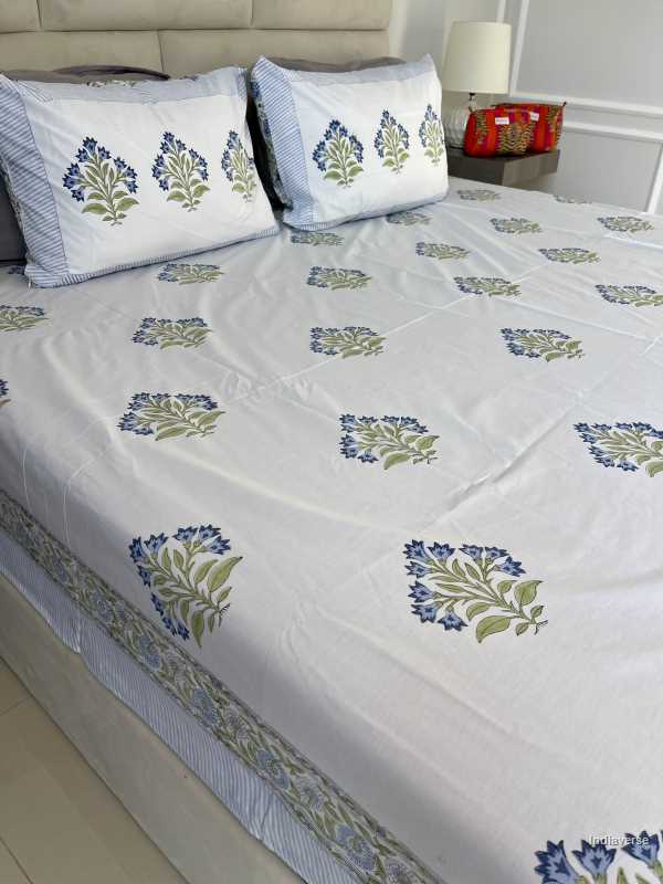 Included in the blue purple bedding set a flat sheet and two pillowcases in pure cotton and hand block print