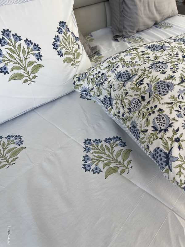 Included in the blue purple bedding set a flat sheet and two pillowcases in pure cotton and hand block print