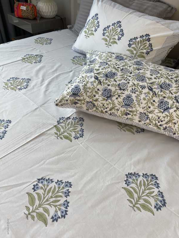 Included in the blue purple bedding set a flat sheet and two pillowcases in pure cotton and hand block print