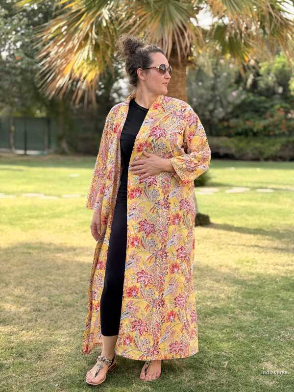 Woman wearing a floral dress in an outdoor setting
