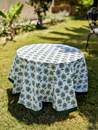 round-table-cloth-with-small-palm-tree-print-on-white-background-and-with-dark-green-border