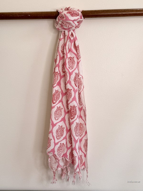 cotton scarf with pink lotus design tied to a wooden beam