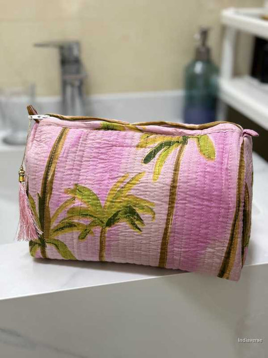 Toiletry Pouch Set with Palm design and pink color for toiletries and cosmetics sitting on sink in bathroom | Pink Palm