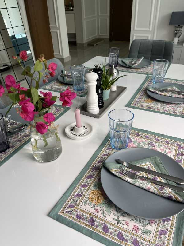 Exquisite 6-piece hand block printed placemat and napkin set in pure cotton stand out with a green purple floral design