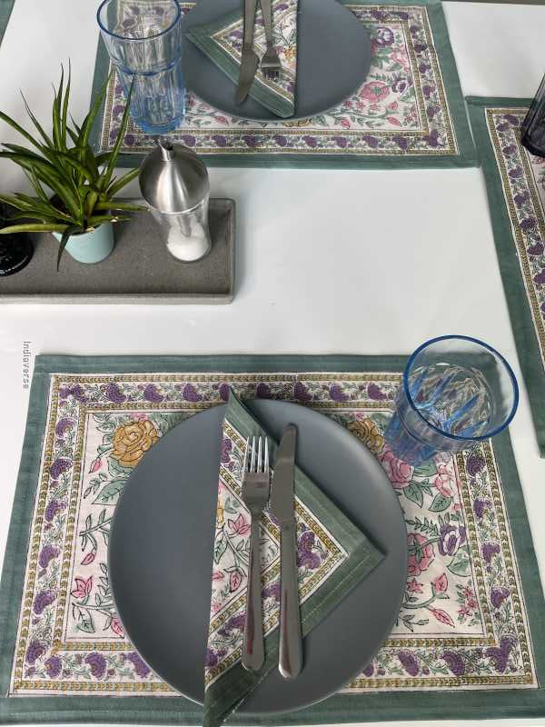 Exquisite 6-piece hand block printed placemat and napkin set in pure cotton stand out with a green purple floral design