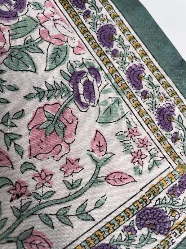 Exquisite 6-piece hand block printed placemat and napkin set in pure cotton stand out with a green purple floral design