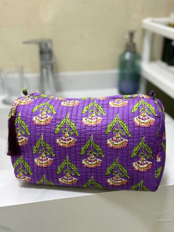 Toiletry Pouch Set with symmetric flower design and purple background in three different sizes for toiletries and cosmetics | Purple Flowers