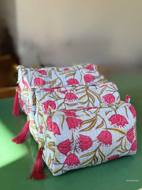 Toiletry Pouch Set with red tulip design and sky blue background in three different sizes for toiletries and cosmetics | Red Tulips