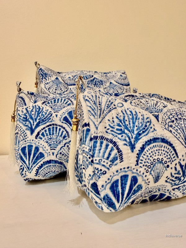 Toiletry pouch set of three pieces with blue coral and sea shell design on white | Blue Sea Shells