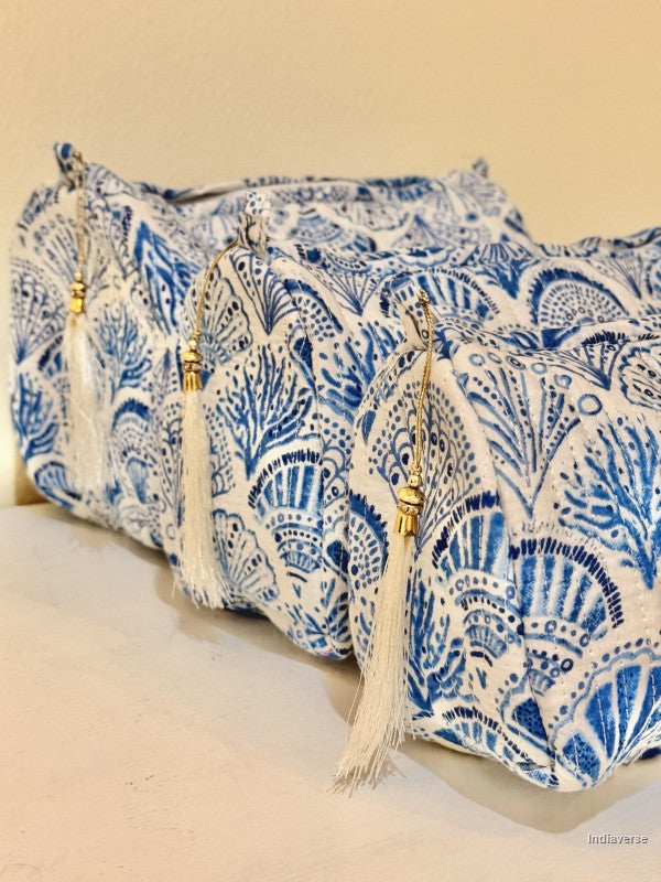 Toiletry pouch set of three pieces with blue coral and sea shell design on white with white tassels | Blue Sea Shells