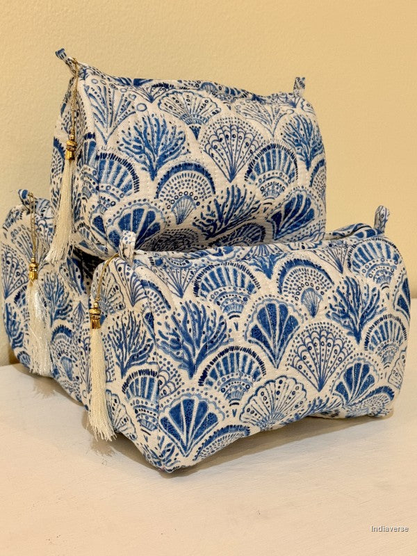 Toiletry pouch set of three pieces with blue coral and sea shell design on white | Blue Sea Shells