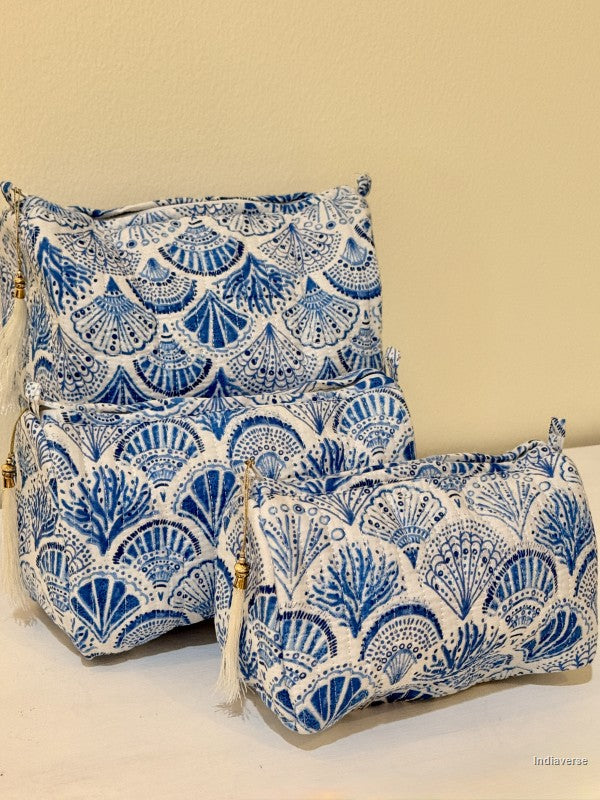 Toiletry pouch set of three pieces with blue coral and sea shell design on white | Blue Sea Shells