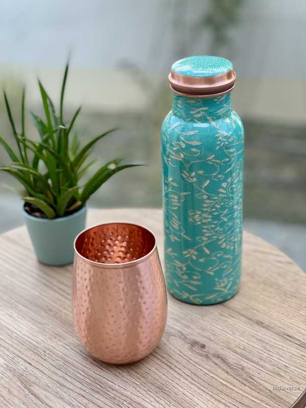 polished copper cup with hammered details made for serving water and healthy alternative to glass