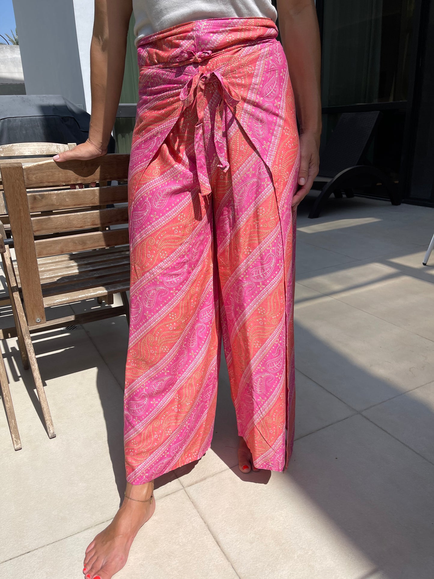 rayon-cotton-wrap-pants-for-tying-around-the-waist-with-Indian-inspired-pink-orange-symmetrical-design