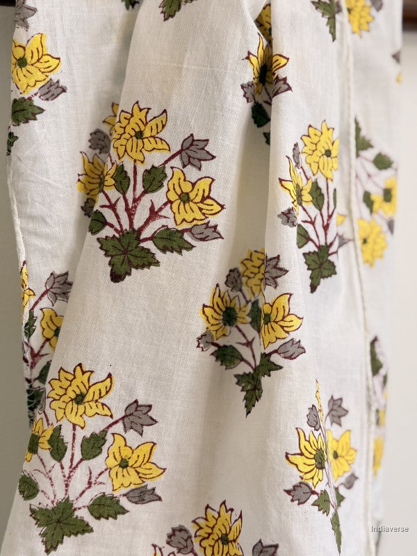close up of a cotton scarf with yellow flower design