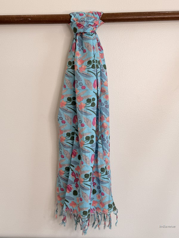 blue floral cotton scarf tied to a wooden beam