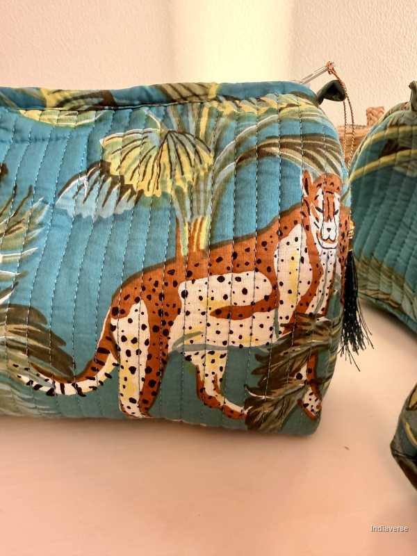 Close up of one of the pouches from the set of three blue pouches with jungle and animal print | Blue Jungle