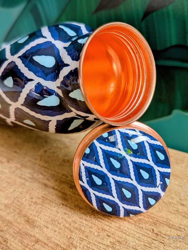 Pure copper bottle with 600 ml capacity and enameled with beautiful blue and white geometrical design perfect for drinking water