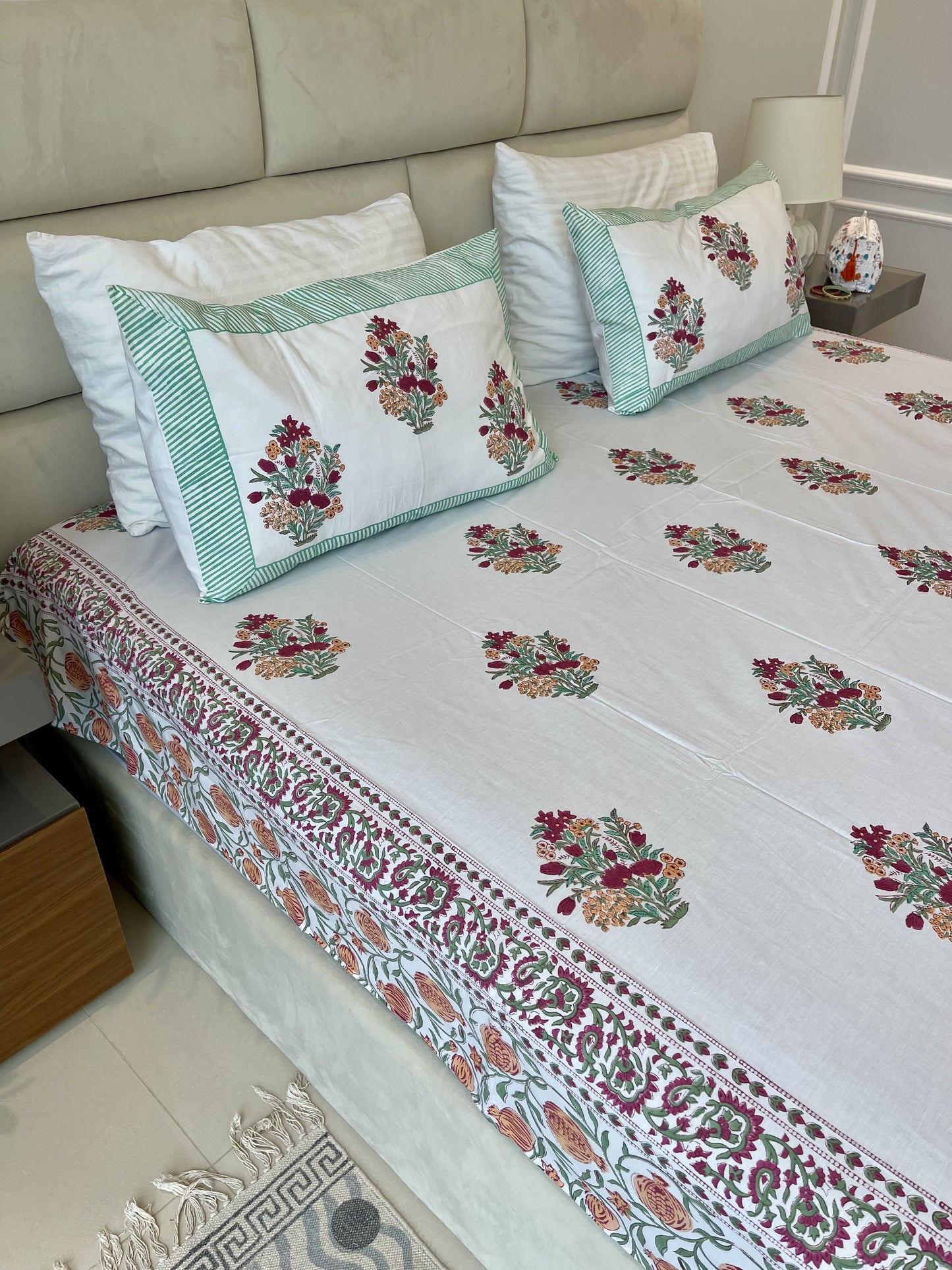 Included in the green orange set colorful bouquet a flat sheet and two pillowcases in pure cotton and handblock printed