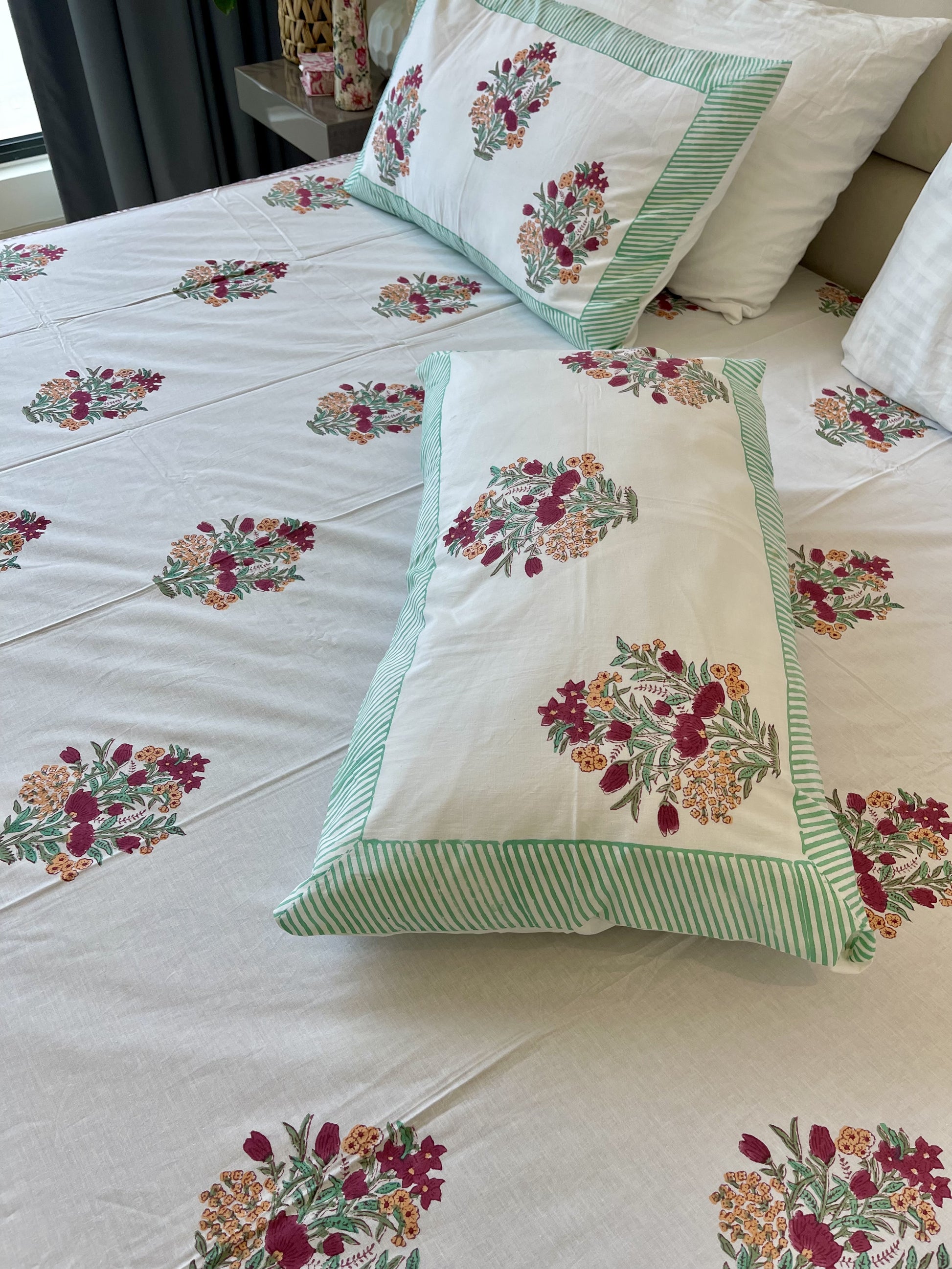 Included in the green orange set colorful bouquet a flat sheet and two pillowcases in pure cotton and handblock printed