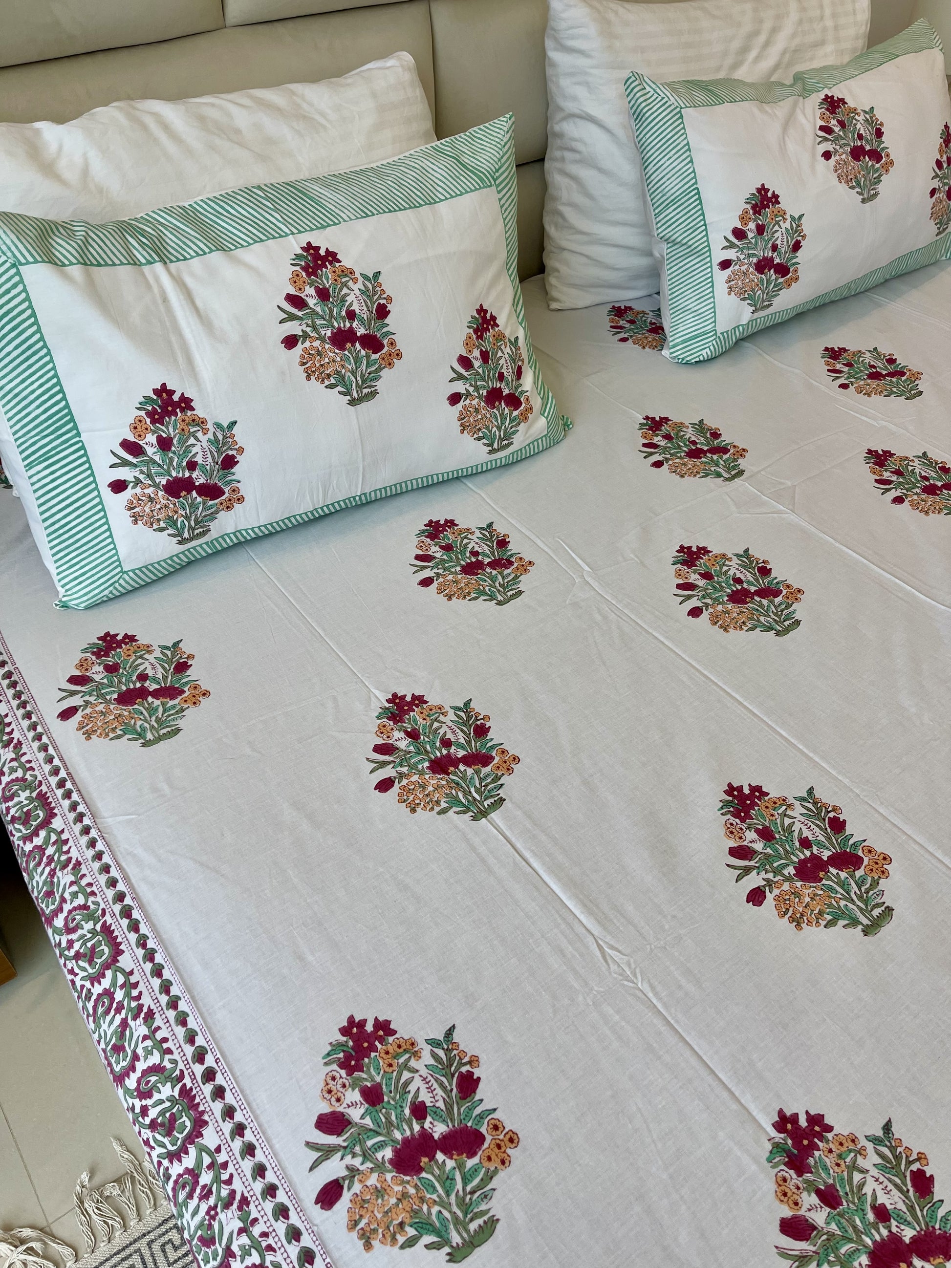 Included in the green orange set colorful bouquet a flat sheet and two pillowcases in pure cotton and handblock printed