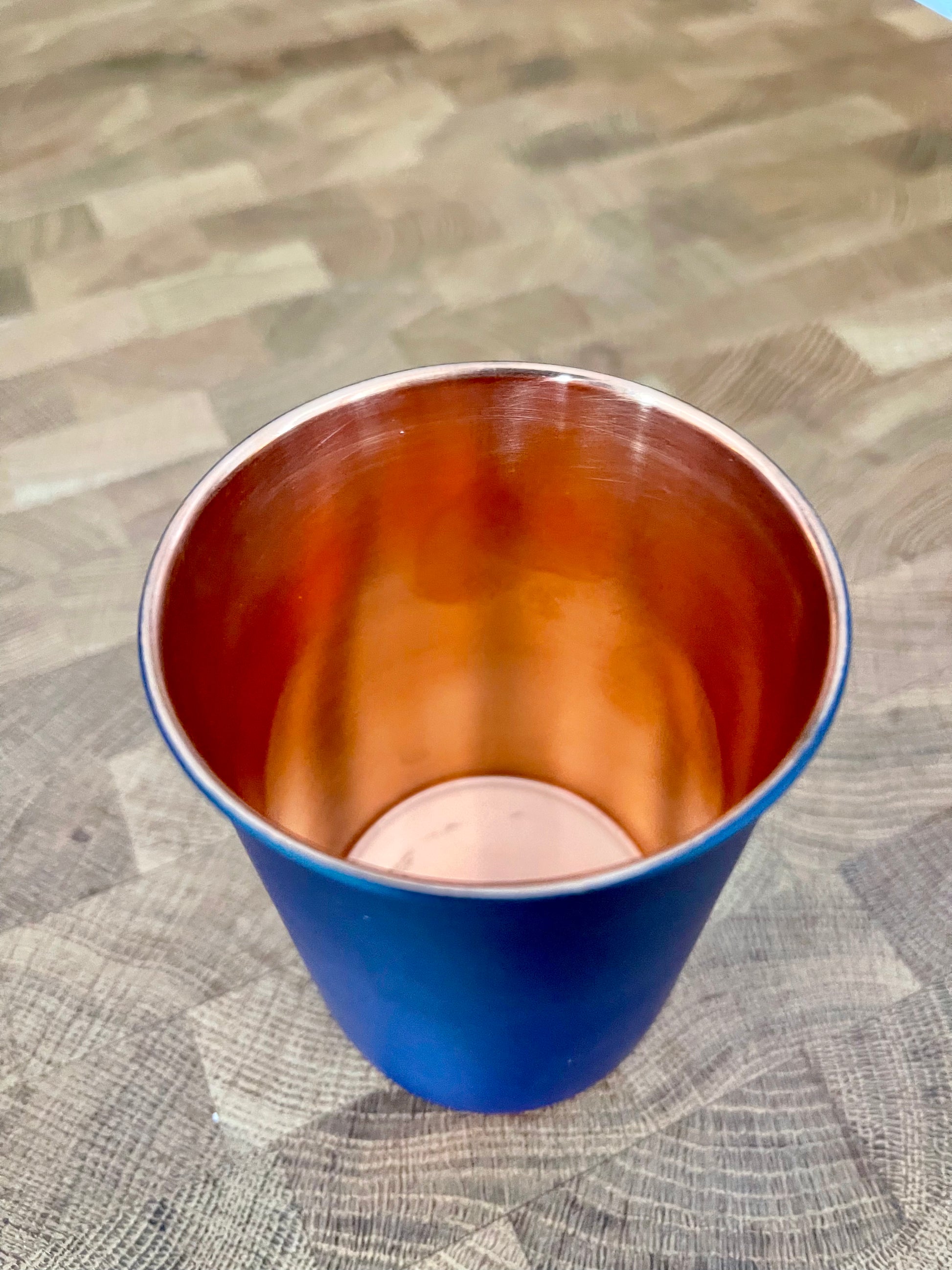 copper-cup-with-blue-lining-on-outside-for-mat-finish-look