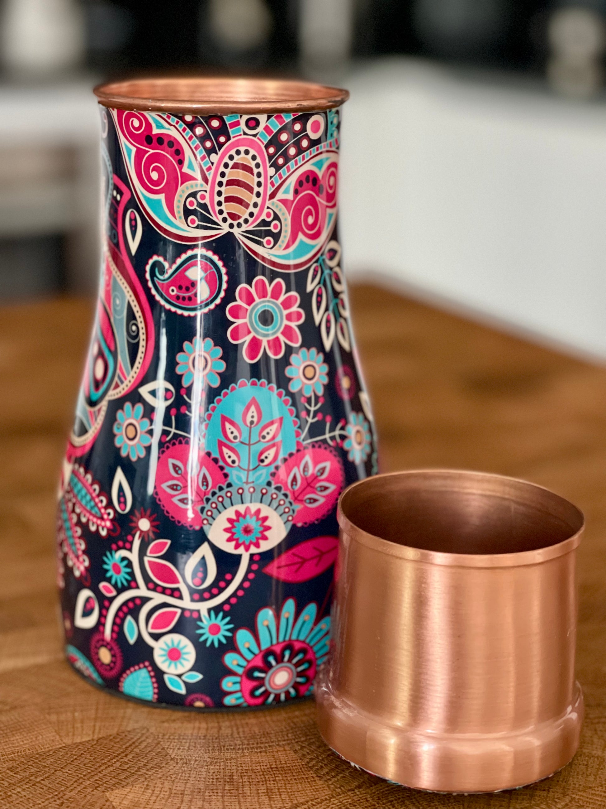 copper-jar-for-drinking-water-with-colorful-enameled-floral-design-and-lid