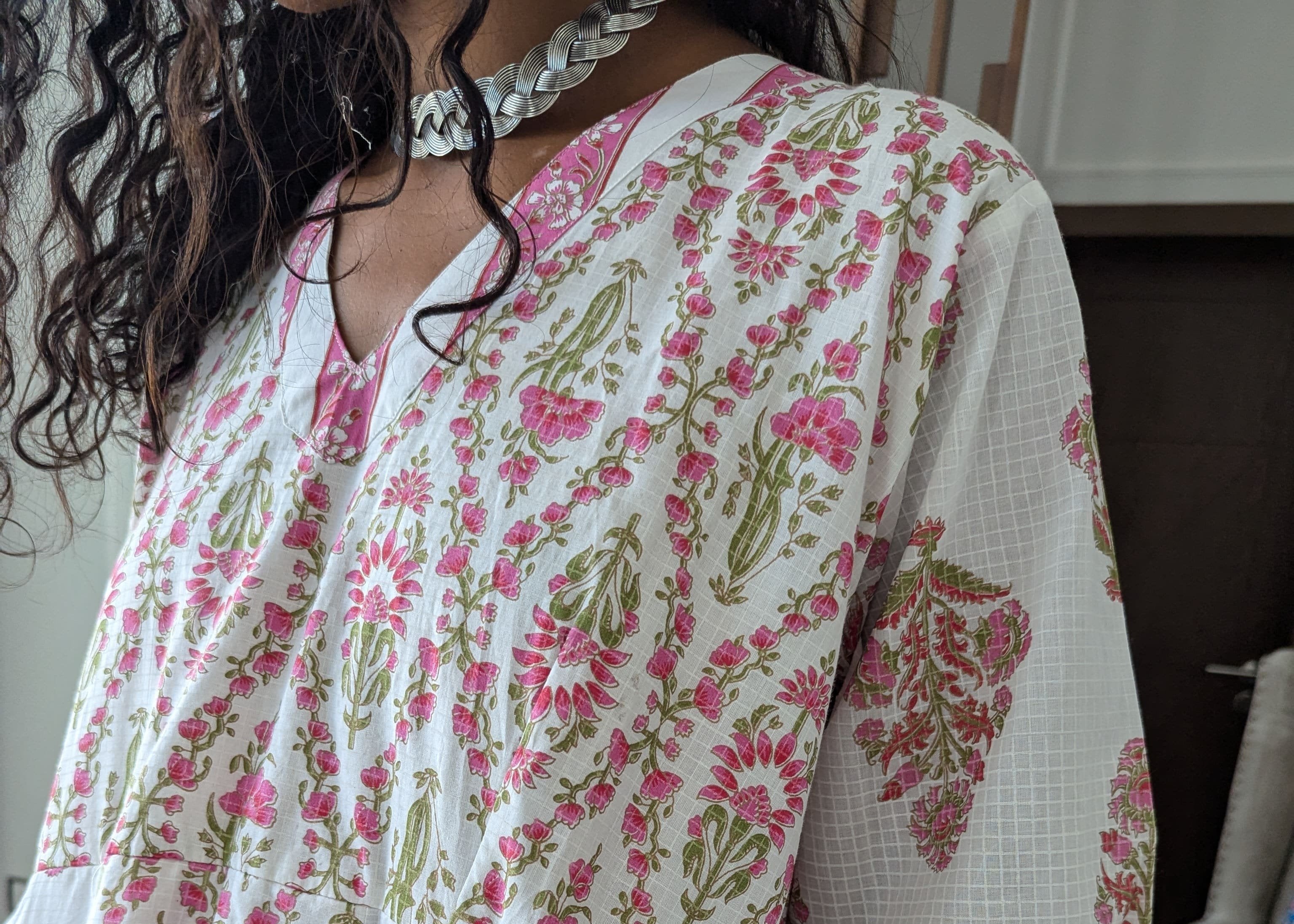 Indian cotton maxi dress with pink flower design on white base full length sleeves