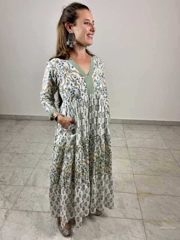 hand block printed soft cotton maxi dress in green and blue tones with complimenting floral designs and matching border and has a cotton underskirt