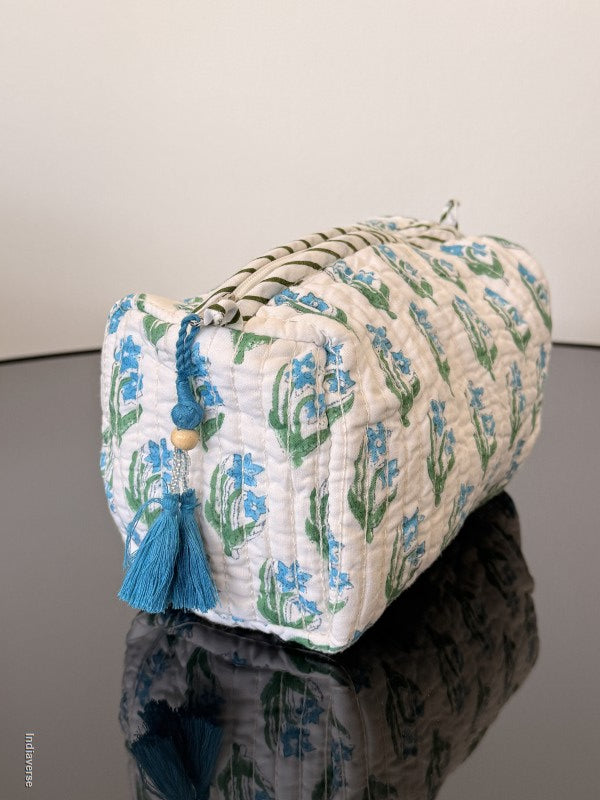 Decorative pillow with floral pattern on a plain background