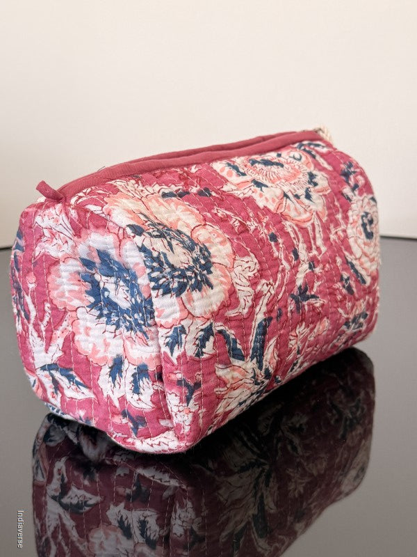 Floral-patterned fabric on a chair with a plain background