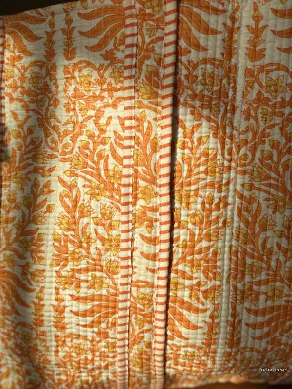 Close-up of orange and white floral patterned fabric