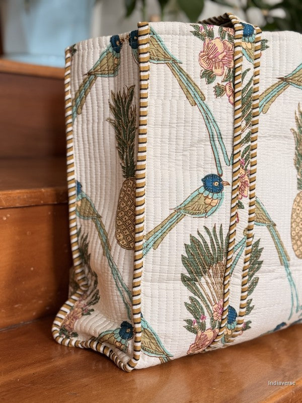 close up of the side of the tote bag with bird motif